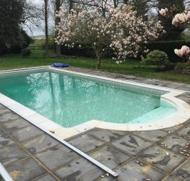 Outdoor Liner pool refurbishment with pool lock safety cover on tracks | Blue Cube Pools