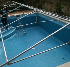 Building a cover so we can work in any weather to complete the new Swimming pool coatings | Blue Cube Pools