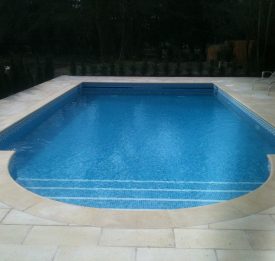 Large outdoor pool with roman end | Blue Cube Pools